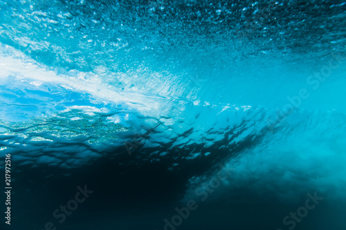 Breaking barrel wave is underwater. Ocean in underwater