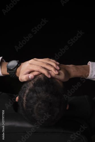 hand of businessman emotion on black background