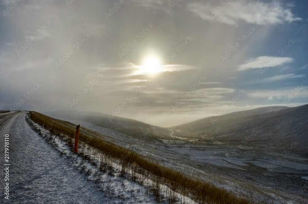 Fototapeta premium Winter in the mountains. Christmas landscape on a sunny morning.