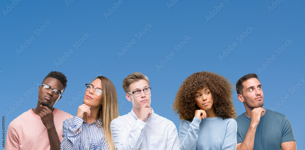 Composition of group of friends over blue blackground with hand on chin thinking about question, pensive expression. Smiling with thoughtful face. Doubt concept. Composition of group of friends over blue blackground with hand on chin thinking about question, pensive expression. Smiling with thoughtful face. Doubt concept.