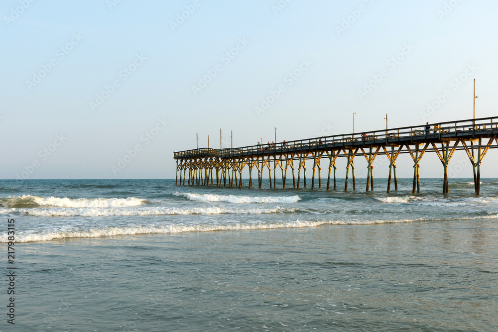 Long fishing pier into the Atlantic Ocean, Sunset Beach, North Carolina