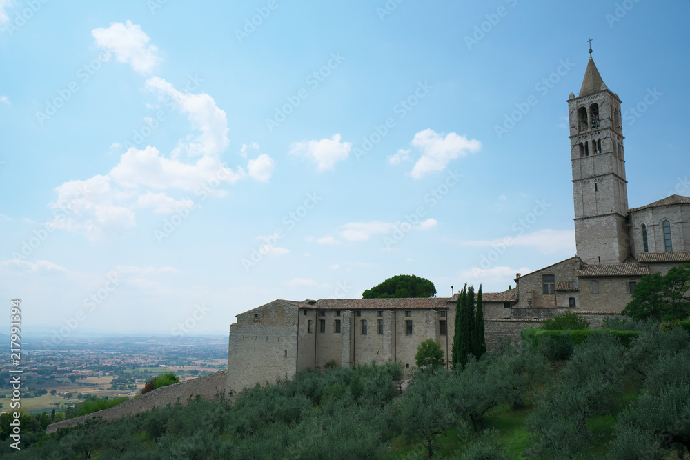 Assisi,Italy-July 28, 2018: View of Basilica di Santa Chiara or Basilica of St. Clare from Borgo Aretino street, Assisi 