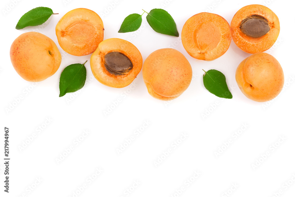 Apricot fruits with leaves isolated on white background with copy space for your text. Top view. Flat lay pattern Apricot fruits with leaves isolated on white background with copy space for your text. Top view. Flat lay pattern