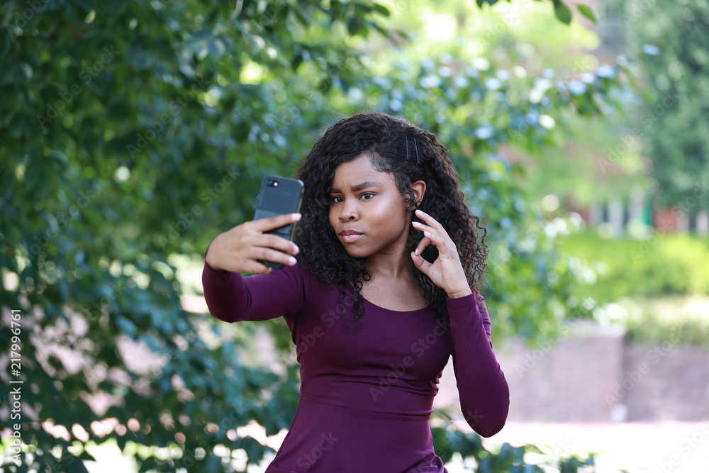 Pretty African American female gesturing OK for selfie Pretty African American female gesturing OK for selfie