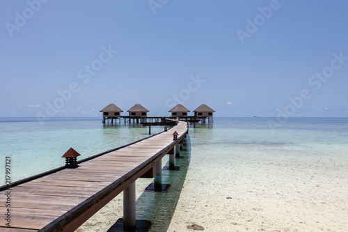 Boardwalk leading to sea villas at Adaraan Prestige Vadoo, Maldives photo