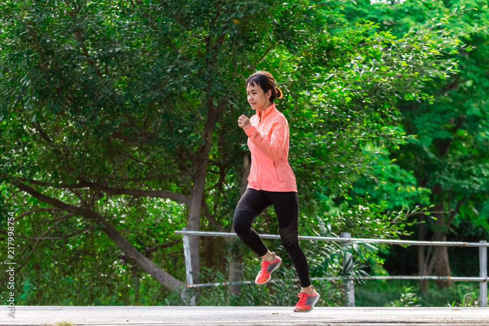 young female running in the park