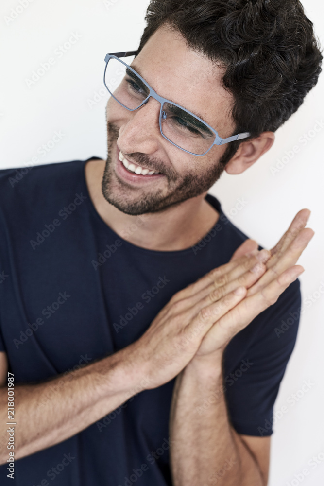 Fototapeta premium Good looking guy in spectacles, looking away