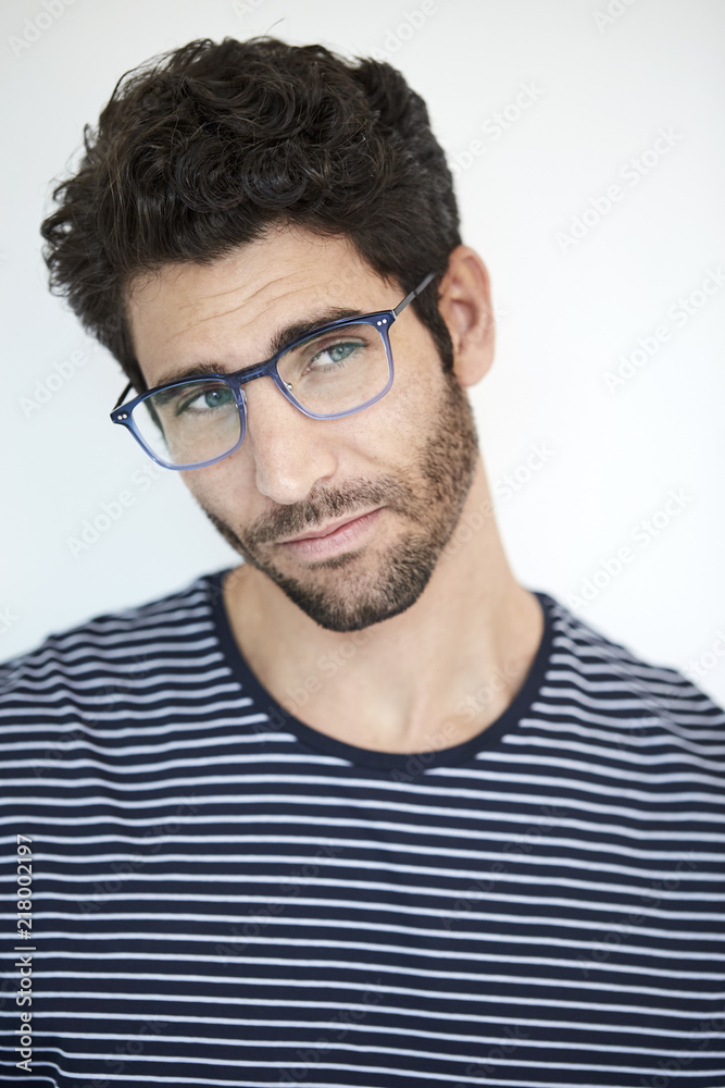 Thoughtful handsome guy in glasses, looking away Thoughtful handsome guy in glasses, looking away