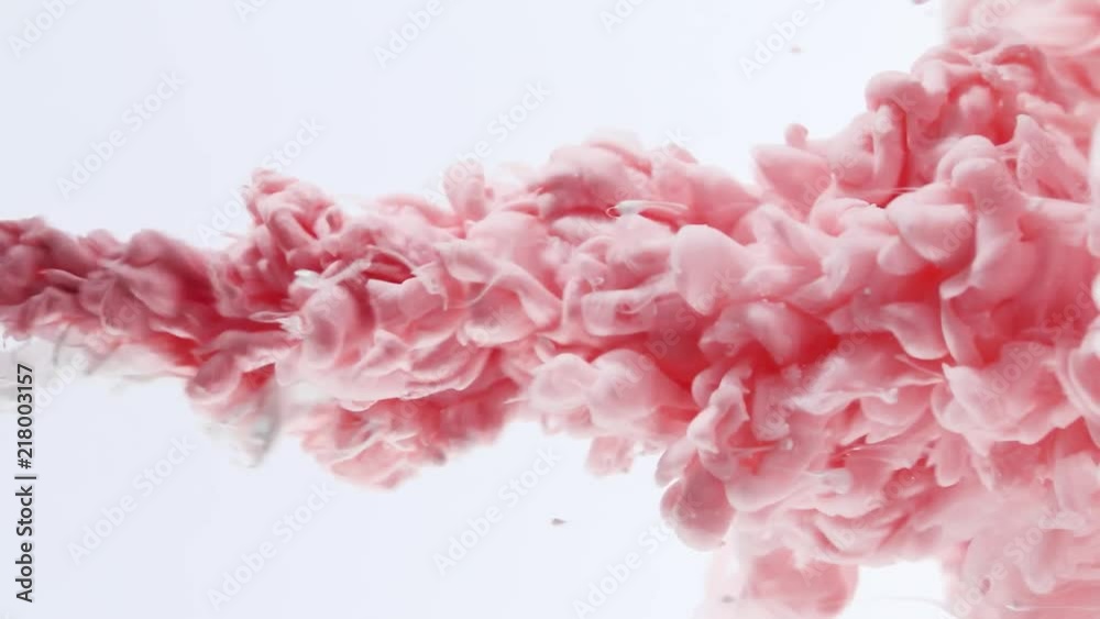 Pink ink dropped into water. Abstract. Pink ink dropped into water. Abstract.
