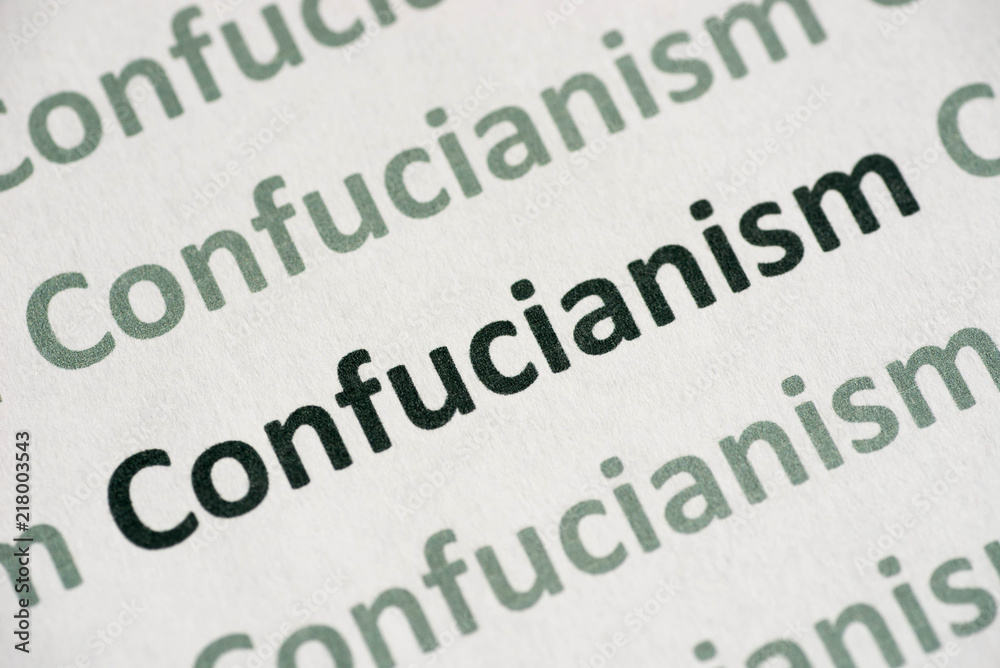 Obraz premium word Confucianism printed on paper macro