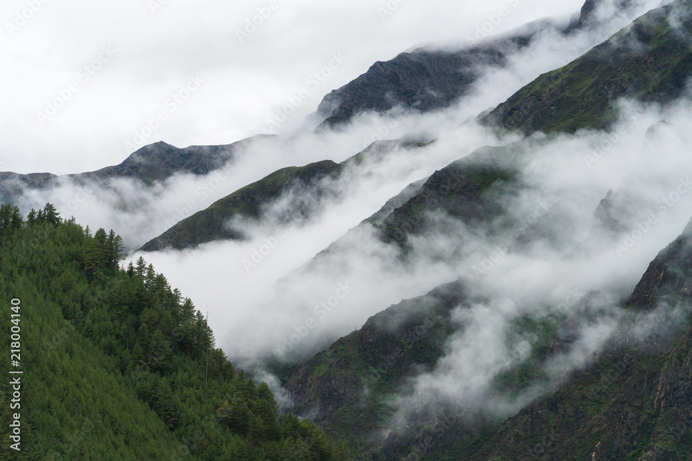 Clouds form around the slopes of the Annapurna Clouds form around the slopes of the Annapurna