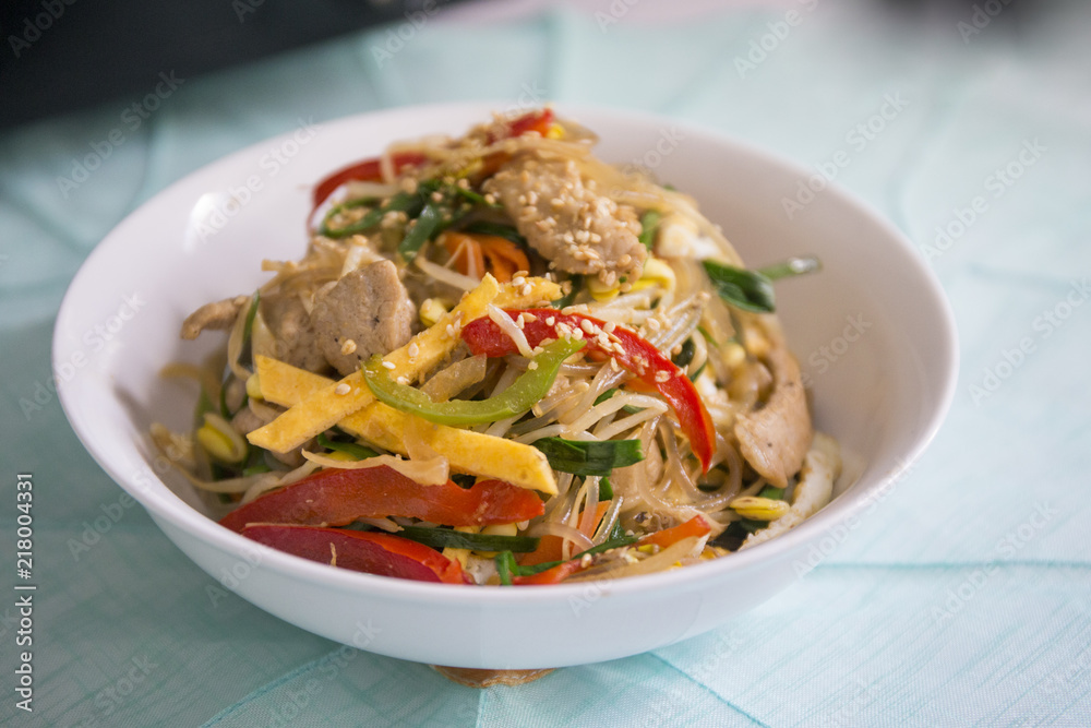 Stir fried Korean glass noodle with soy sauce called Japchae Stir fried Korean glass noodle with soy sauce called Japchae
