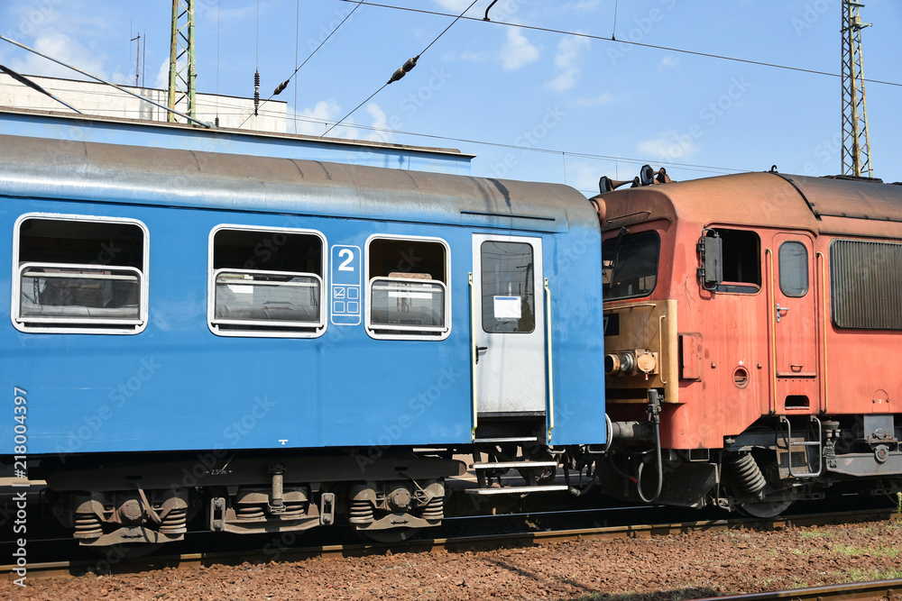 Engine and railway carriage at the station Engine and railway carriage at the station