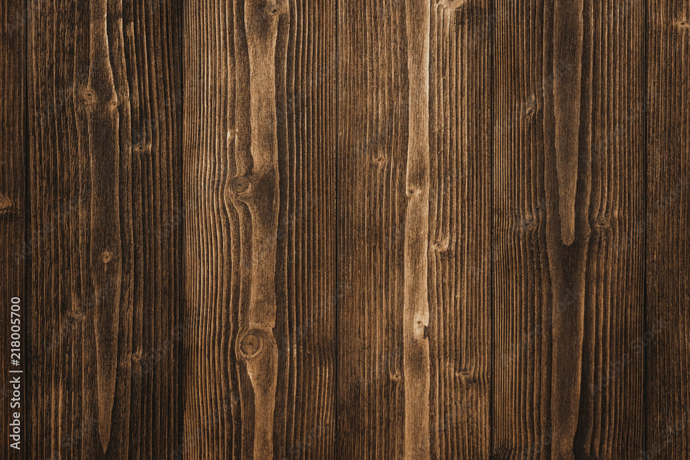 Obraz premium Dark brown wood texture with natural striped pattern background