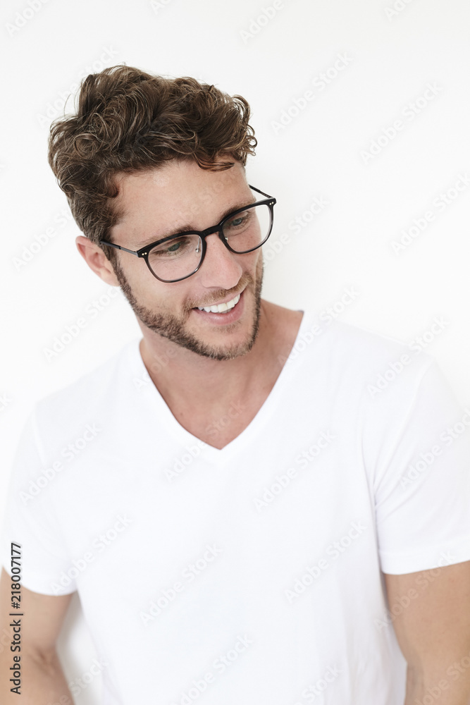 Handsome dude in white t-shirt and glasses