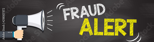 Hand holding megaphone with Fraud Alert text. Hand holding megaphone with open space for your text.