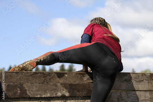 Mud race runners during extreme obstacle races