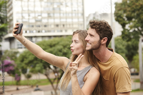 Posing couple for Smartphone selfie, brazil