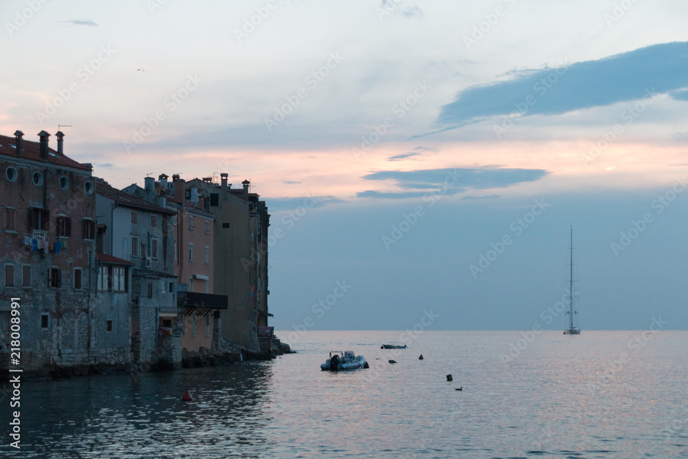 Rovinj, Croatia - July 24, 2018: View to the old, partly dilapidated houses, in the old town of Rovinj, directly at the sea, croatia.
