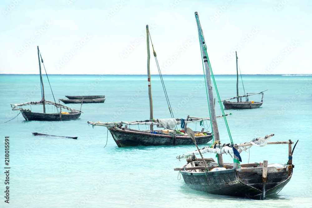 Dhow boats in Zanzibar. Sailing boats at sea on Zanzibar Island.
