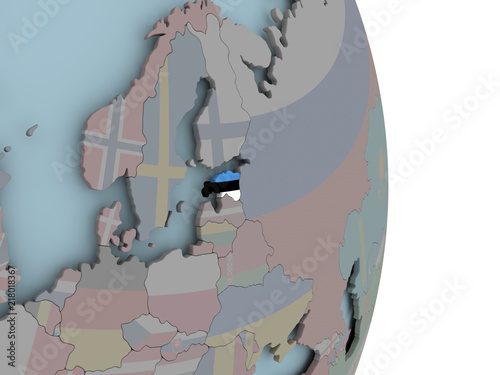 Map of Estonia on political globe with flag
