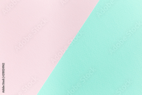Pink and mint green paper texture, diagonal devided, blank background for template, horizontal, copy space