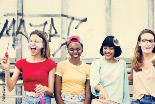 A group of diverse woman friends having fun together