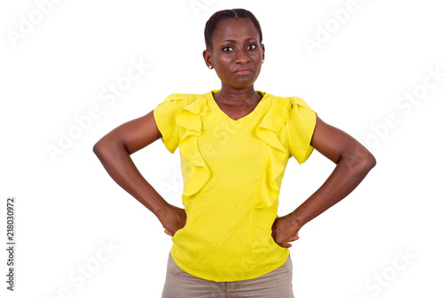 surprised woman standing in studio on white background © vystekimages