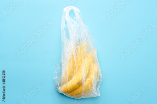 Yellow ripe fresh bananas in transparent plastic bag