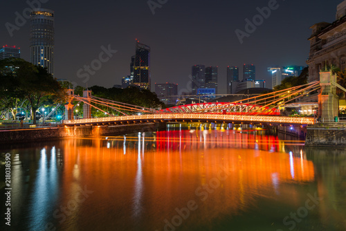 Cavenagh Bridge over the Singapore River is one of the oldest bridges and the only cable stayed suspension bridge in Singapore © pomphotothailand