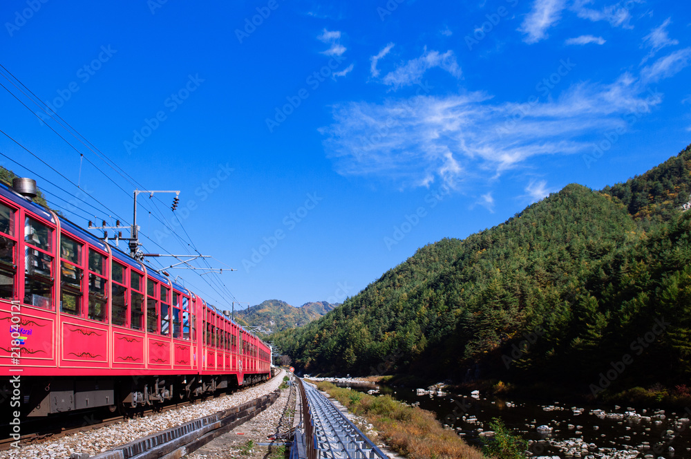 V-Train sightseeing train run along stream and valley of Gangwon-do, South Korea