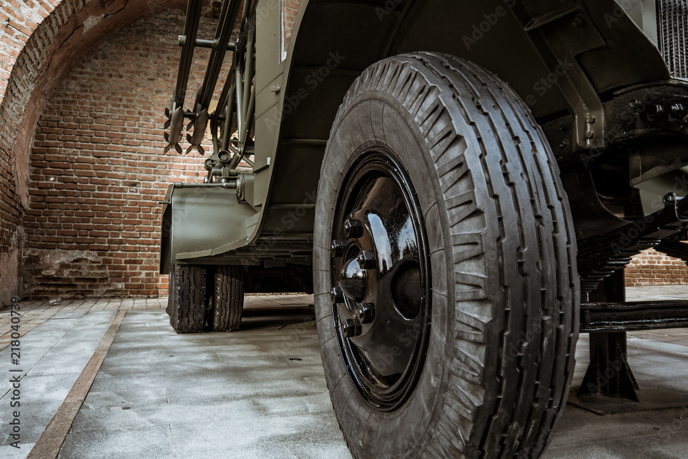 The wheel of the old Soviet military machine. In the park of the exhibits of military equipment