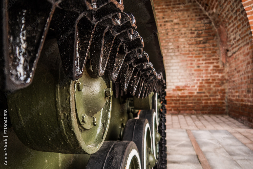 Caterpillars of the old Soviet military machine. In the park there are exhibits of military equipment.
