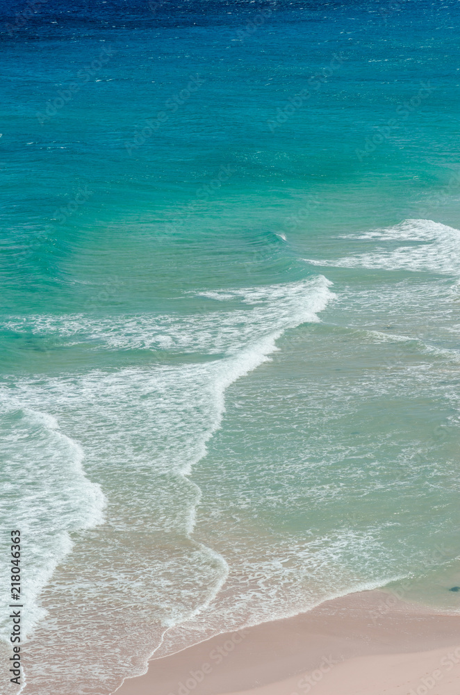 ocean landscape. blue and deep blue water of ocean and beach with surf wave