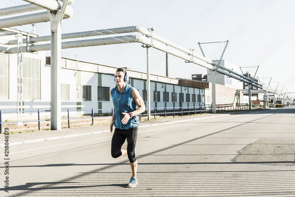 Young athlete jogging in the city