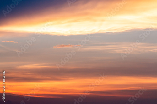 colorful dramatic sky with cloud at sunset.