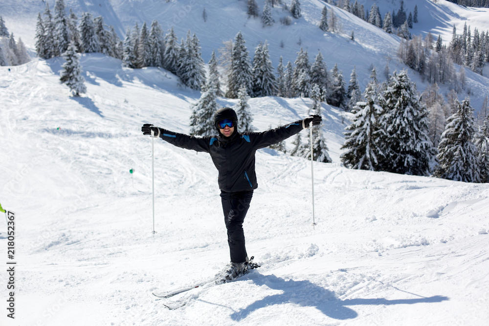 Young man, skiing in Austrian Alps