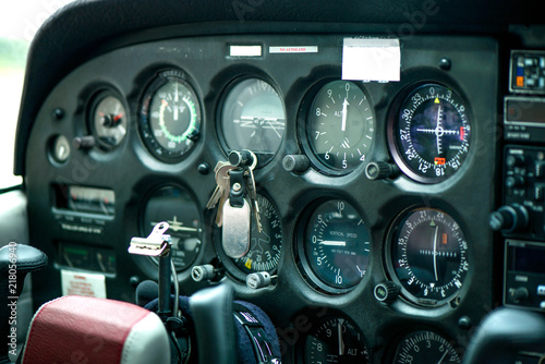 Detail of old airplane cockpit. Aircraft equipment, various indicators, buttons, instruments. The flight desk and control panel during take off and landing. Aircraft dashboard panel in pilot school