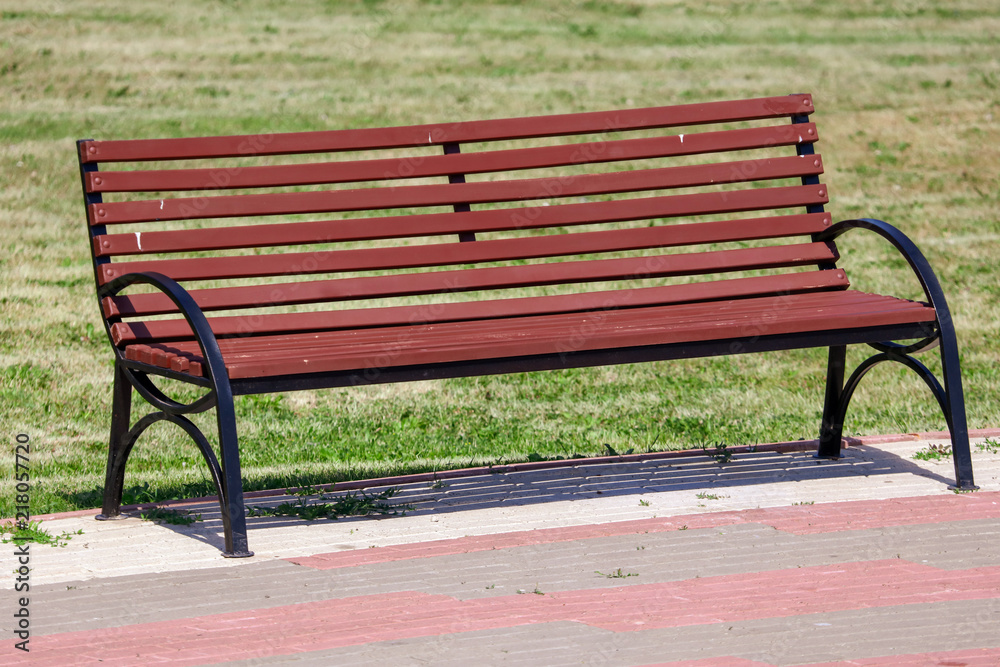 A wooden bench in a park