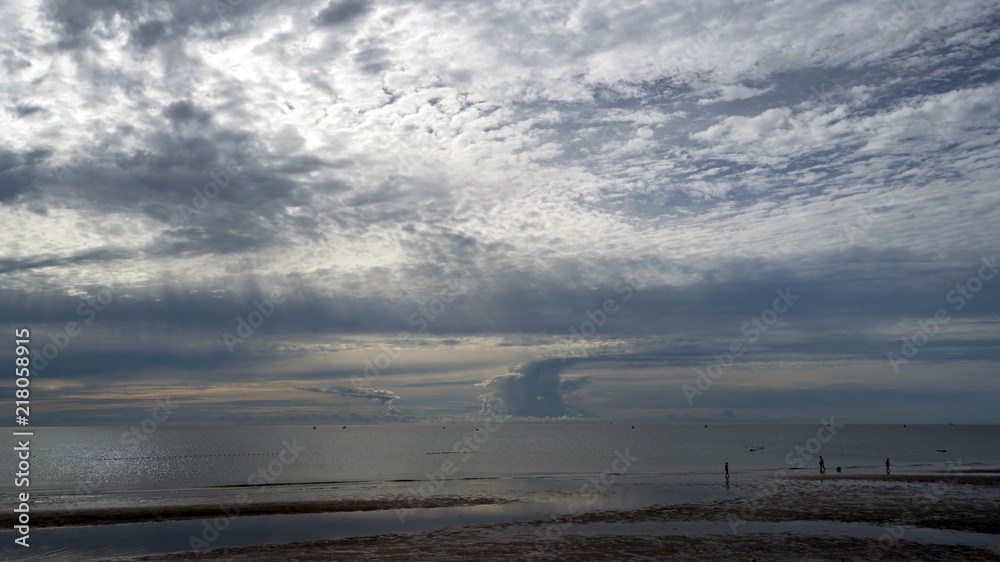 Morning on the Hua Hin beach is a bit gloomy when storm clouds still linger after heavy rain during the night.