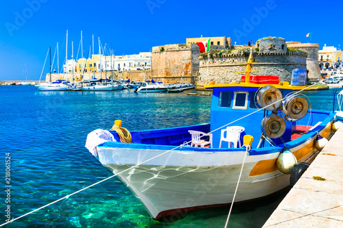 Old port of Gallipoli, view with castle amd boats, Puglia , Italy photo