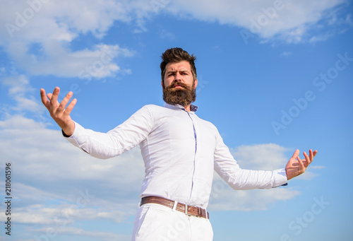 Self proud feeling. Hipster beard and mustache looks attractive white shirt. Guy enjoy top achievement. Superiority and power. Man bearded hipster formal clothes feels proud of himself sky background