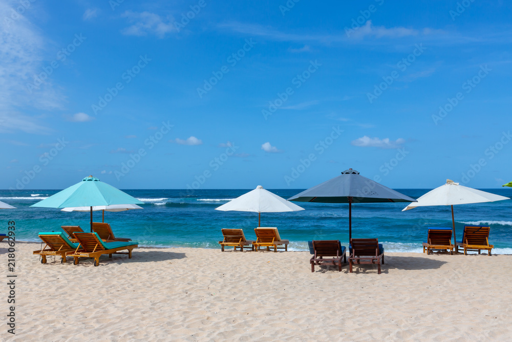 Place for beach holidays with umbrellas at  Bali island,Nusa Dua beach area,Indonesia