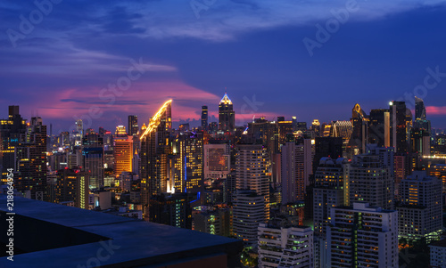 scenic of twilight skyline with cityscape on rooftop view photo