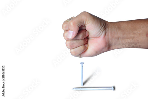 a punch of adult in action of hitting on nail on white background isolated