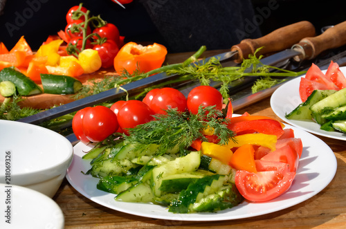 fresh vegetables cucumber tomatoes pepper and salad leaves