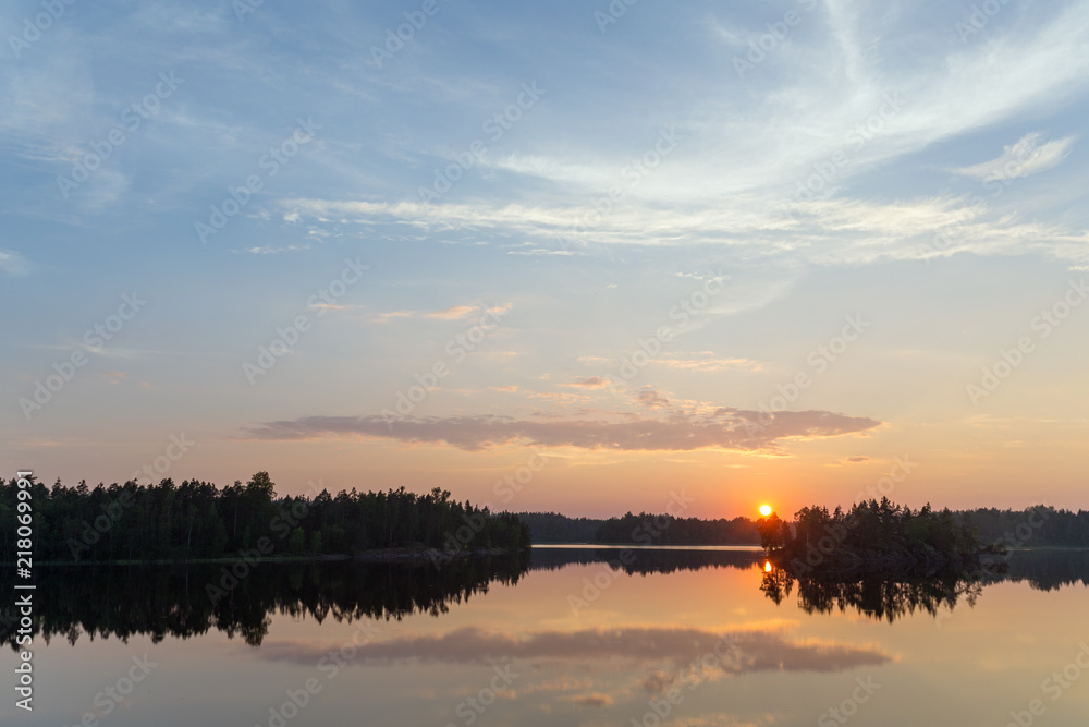 sunset over a forest lake sunset over a forest lake