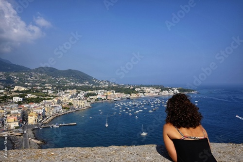 tourist woman admires ischia panorama © robypangy