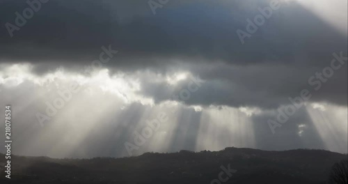 The calm after the storm, rays of sun quickly transpire through the clouds