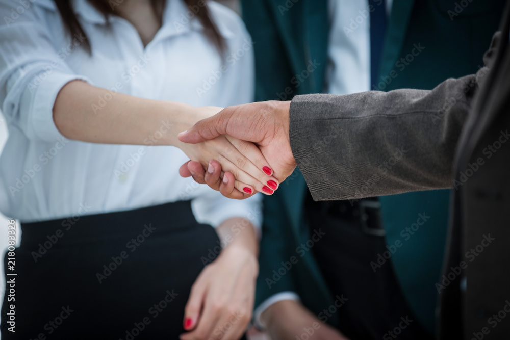 closeup. handshake business woman with a business partner
